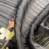 Tesatura voal jacquard din matase naturala cu bordura cu flori pe o latura
