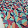 Tesatura cu paiete translucide - design multicolor