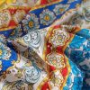 Tesatura fina din bumbac cu broderie  spartă - benzi etno cu motive florale , Multicolor