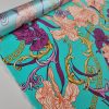 Tesatura din matase naturala elastica - design stilizat floral , turcoaz – portocaliu – bordo - auriu