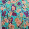 Tesatura din matase naturala elastica - design stilizat floral , turcoaz – portocaliu – bordo - auriu