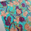 Tesatura din matase naturala elastica - design stilizat floral , turcoaz – portocaliu – bordo - auriu