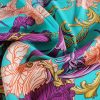 Tesatura din matase naturala elastica - design stilizat floral , turcoaz – portocaliu – bordo - auriu