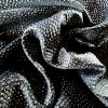 Tesatura jacquard cu buline aurii pe fond negru