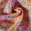 Tesatura plina din matase naturala , tip mikado - design floral,  Portocaliu Violet