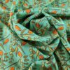 Tesatura crepe de chine din matase naturala - Imprimeu floral / ghirlande de flori portocalii pe fond verde turcoaz
