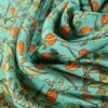 Tesatura crepe de chine din matase naturala - Imprimeu floral / ghirlande de flori portocalii pe fond verde turcoaz - imagine 3