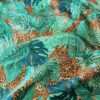 Tesatura din in - imprimeu cu frunze exotice pe fond animal print, Verde Maro