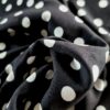 Tesătură dublu crepe din viscoza cu buline mici albe pe fond negru - imagine 5