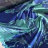 Tesatura jacquard cameleon - design cu flori schitate, Albastru cerneală  - Turcoaz azuriu - imagine 2