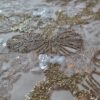 Dantela cu broderie și paiete translucide ivoire, cu fir auriu aplicat pe suport de tulle fin crem - imagine 4