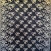 Tesatura premium - Dantela Chantilly cu borduri bilaterale cu flori aurii pe fond negru