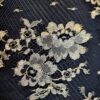 Tesatura premium - Dantela Chantilly cu borduri bilaterale cu flori aurii pe fond negru - imagine 10