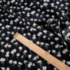 Tesatura crepe de Chine din matase naturală cu imprimeu de margarete mici pe fond Negru - imagine 4