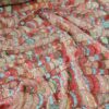Tesatura brodata cu paiete multicolore pe suport de tulle elastic fond crem deschis