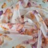 Tesatura Organza din matase naturala imprimată cu buchete de flori multicolore pe fond Ivoire
