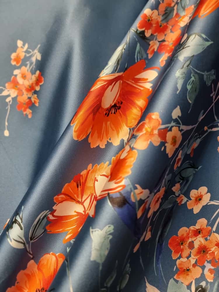 Tesatura twill din matase naturala - tip mikado Imprimată cu flori portocalii pe fond albastru petrol - imagine 3