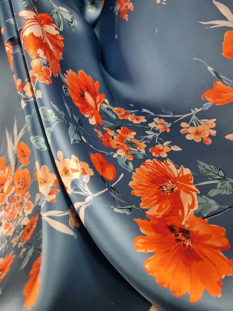 Tesatura twill din matase naturala - tip mikado Imprimată cu flori portocalii pe fond albastru petrol - imagine 4