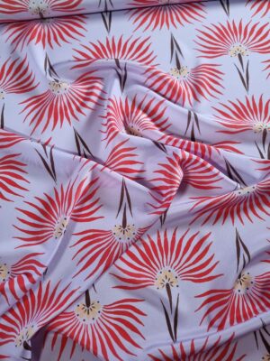 Tesatura fina din matase naturala - crepe de chine subțire cu flori stilizate roșii pe fond mov - lila